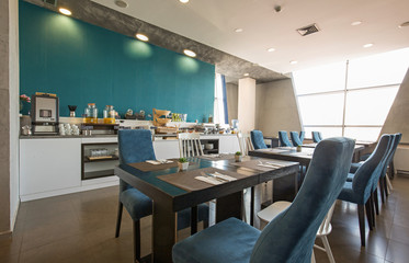 Hotel breakfast, buffet table, restaurant interior