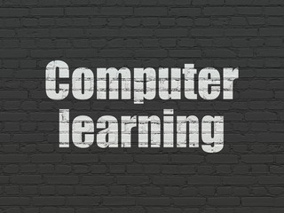 Studying concept: Painted white text Computer Learning on Black Brick wall background