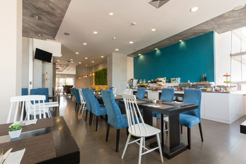 Hotel breakfast, buffet table, restaurant interior