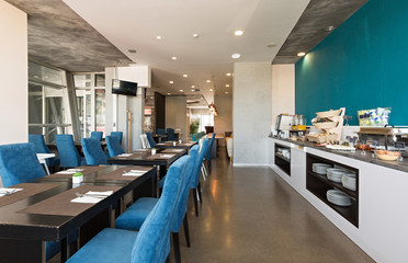 Hotel breakfast, buffet table, restaurant interior