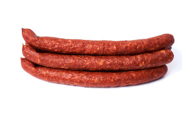 Thin smoked sausages isolated on a white background