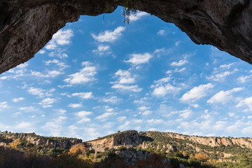 Beautiful landscape of rock valley which is looked through the archway cave, Geyikbayiri, Turkey , Trebena
