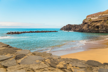 Canary Islands. Beautiful beaches on a sunny day on the island of Tenerife. Shores of the atlantic ocean.