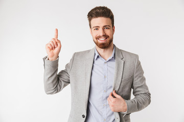 Portrait of a smiling young man dressed in shirt