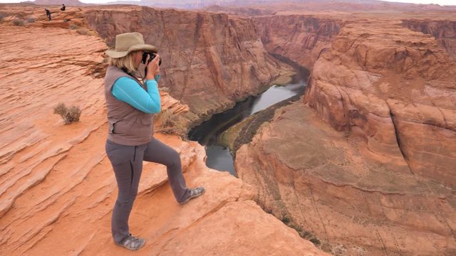 Woman On Observation Deck Taking Pictures Canyon Horseshoe Colorado River