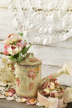 vintage style decoration with old watering can