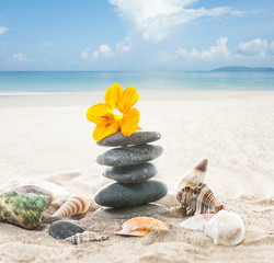 Fototapeta na wymiar stack of stones on ocean beach