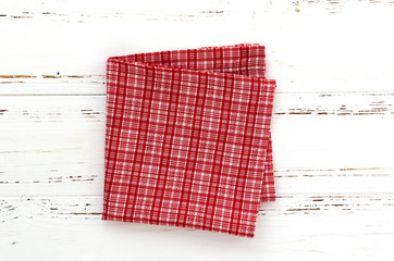 red kitchen cloth on white vintage wooden table. copy space