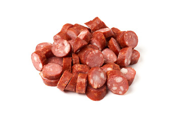 Pile of sliced smoked sausage isolated on white background with shadow