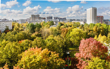 Fototapeta premium City landscape through a window glass. Autumn