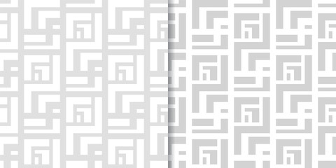 Set of geometric ornaments. Light gray seamless patterns