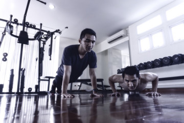 Fototapeta premium Twins with exercise And build muscle to look better.