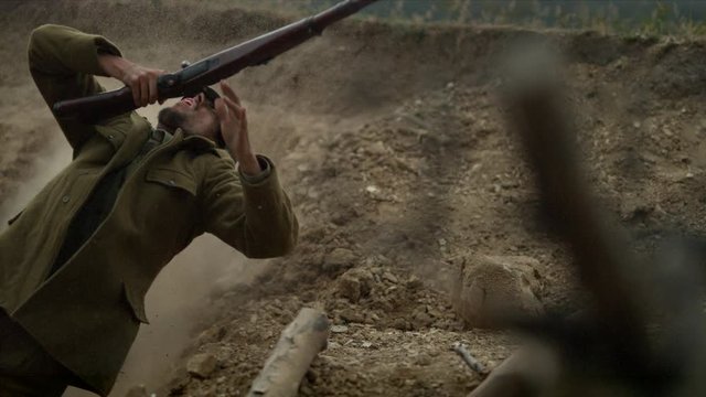 WW2 soldier falling on the ground, slow motion