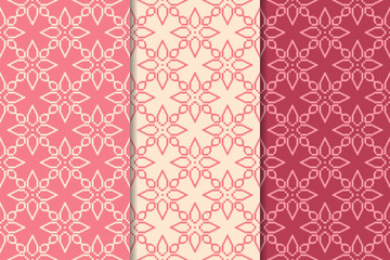 Set of red floral ornaments. Cherry pink vertical seamless patterns
