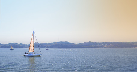 Fototapeta premium ship sailboat on the river there is a place for the inscription