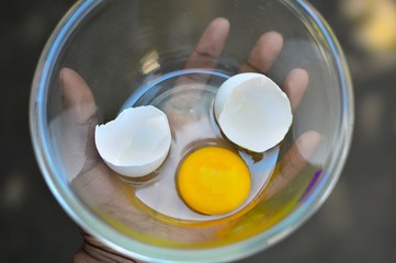 Broken egg in a bowl