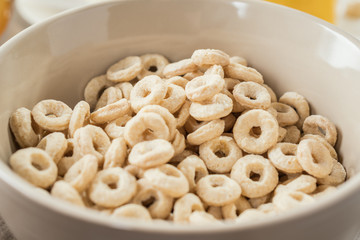 Delicious Healthy breakfast.  Whole Grain Cereal rings, close-up. Cheerios whole grain cereals. Healthy food.
