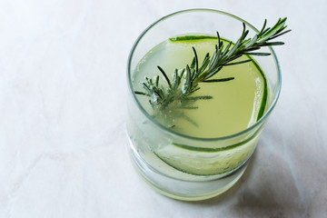 Rosemary Gin Gimlet Cocktail with Cucumber Slice.