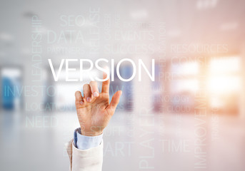 Concept of modern business with palm choocing on of keywords for success