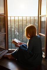 girl is reading a book