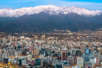 Fototapeta na wymiar Panoramic view of Providencia district with Los Andes Mountain Range in the back, Santiago de Chile