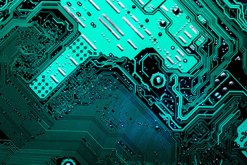 Close up of a printed blue computer circuit board