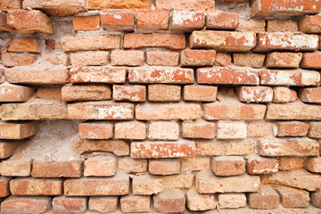 Brick wall collapsing from erosion