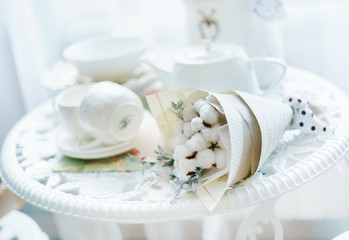 Fototapeta na wymiar table with flowers and tea cups