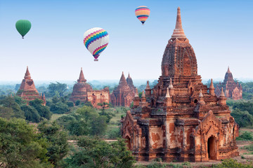 Colorful hot air balloons flying over Bagan, Mandalay division, Myanmar - obrazy, fototapety, plakaty