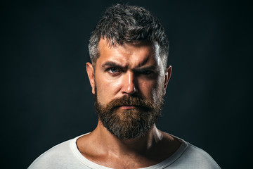 Portrait of self confident brutal man. Karate man is preparing for the competition. Handsome karate man practicing with Karate Martial Art. © Svitlana