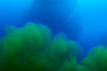 Fototapeta na wymiar Mixed blue and green liquid background