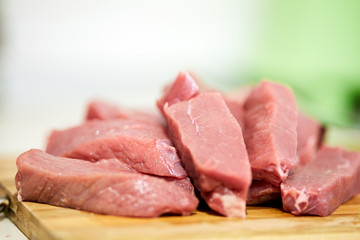 Raw beef on a wooden board