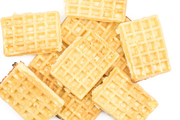 Traditional waffle (Belgian) stack top view isolated on white background sweet delicate and airy.