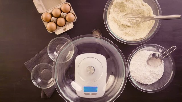 Time lapse. Step by step. Ingredients for baking french macarons on the table