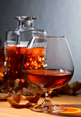 Brandy and dried up oak leaves .