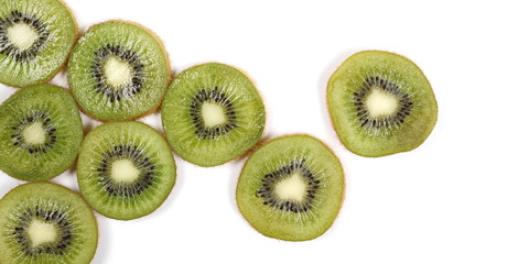 Kiwi fruit slices isolated on white background, top view