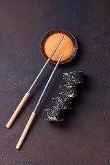Fototapeta na wymiar Top view sushi roll with black sesame