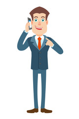 Businessman pointing his finger at the mobile phone that he talks