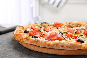 Tasty pizza on table. Fresh from oven