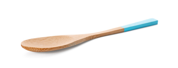 Wooden spoon on white background. Handcrafted cooking utensils