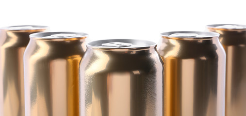 Cans of beer on white background, closeup