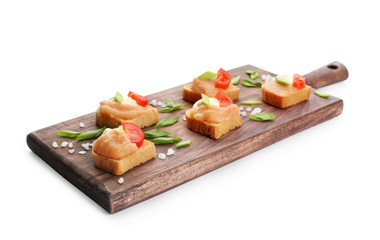 Wooden board with delicious cod caviar appetizers on white background