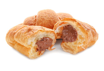 Tasty croissants with chocolate on white background