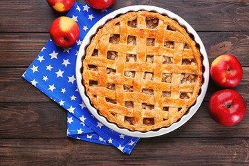 Delicious American apple pie on table