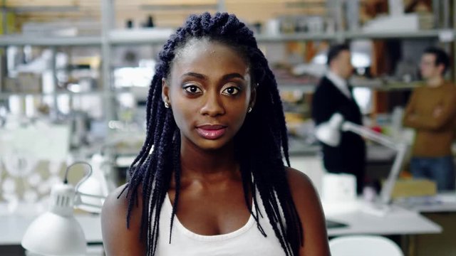 African-american girl in design and engineering architecture office.