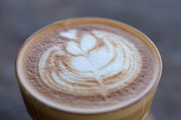 Backgrouds of latte coffee on table.