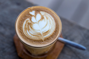 Backgrouds of latte coffee on table.