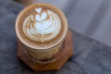 Backgrouds of latte coffee on table.