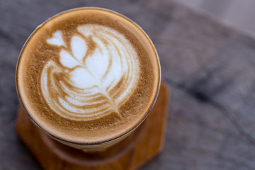 Backgrouds of latte coffee on table.