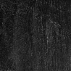 Dark grey black slate background or texture.
